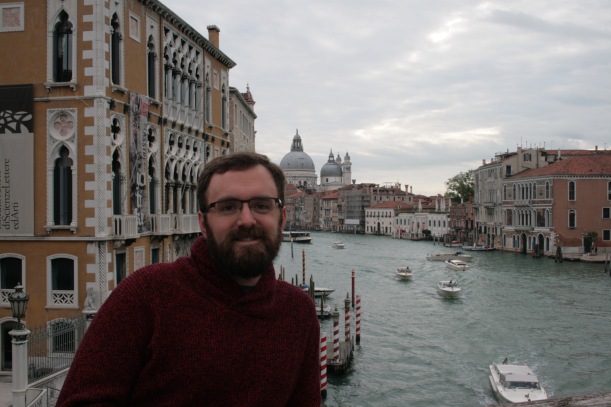 My handsome husband posing on a bridge in Venice.